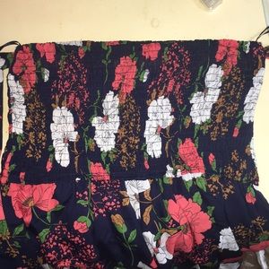 Rosy Cheeks Navy floral romper from Fashion Nova